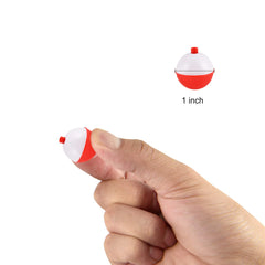 Snap-on red and white fishing bobbers close-up