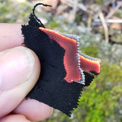 Coopers Bay charcloth tinder tin with rolled charred cloth for quick ignition
