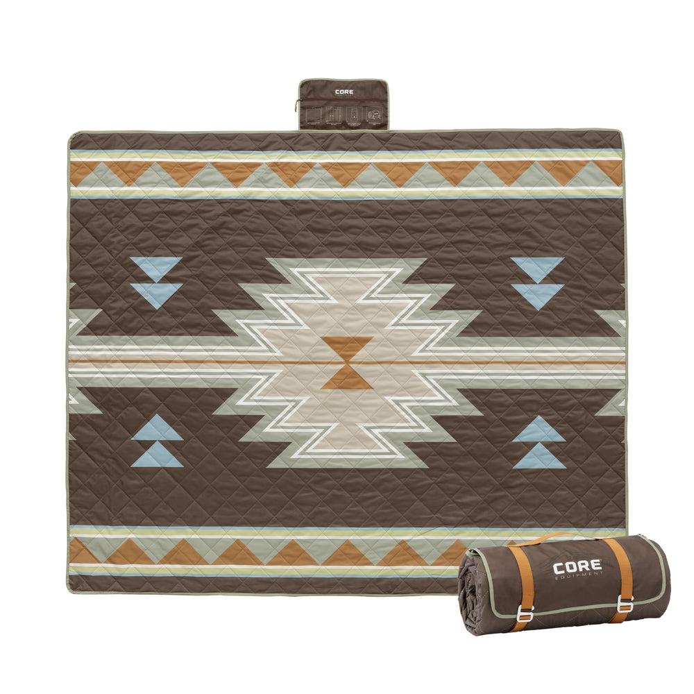 CORE Outdoor Weighted Blanket on a picnic setup provides stable comfort on windy days.
