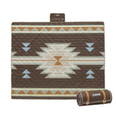 CORE Outdoor Weighted Blanket on a picnic setup provides stable comfort on windy days.