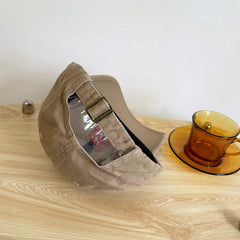 CORIRESHA cap side view highlights retro Japanese embroidery and breathable cotton