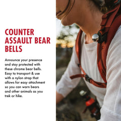 Counter Assault bear bell chrome finish close-up for easy trail attachment