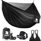 Covacure camping hammock with tree straps ready for quick setup on sturdy anchors.