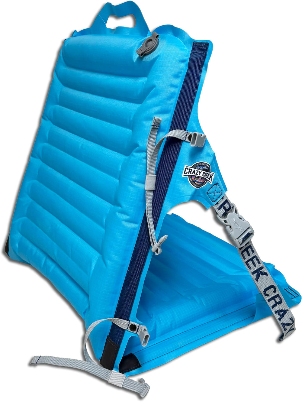 Crazy Creek AirCliner Original inflated chair in Big Sky Blue for comfortable beach lounging.