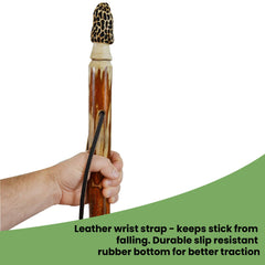 CreationCarvings leather-strap walking stick keeps essentials close.