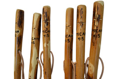 CreationCarvings Leather strap walking stick offers secure grip on long treks