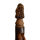 CreationCarvings walking stick with wood handle for comfortable trails.