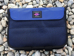 Creative Angler Finsport 12x7 Wallet navy lid-closed demonstrates secure watertight seal and spill protection.