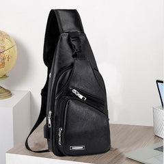 Crossbody Sling Bag main compartment fits up to 8-inch tablets.