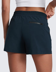 CRZ YOGA shorts fabric close-up showing quick-dry, breathable 4-way stretch for comfort.