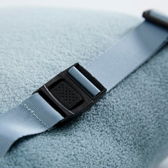 Cuddledown travel blanket shown as lightweight, portable companion on trips.