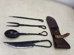 Cutlery Set Spoon and fork close-up highlights hand-forged texture and black finish.