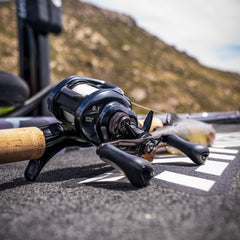 Daiwa Laguna LT Spinning reel side profile highlights a slim, tough LT design in hand.