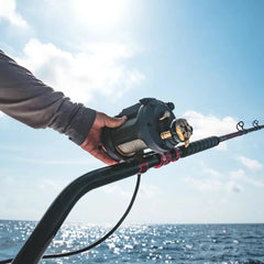 Daiwa Sea Power 1200 Electric Reel side view with handle