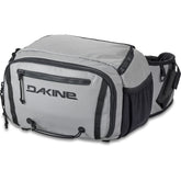 Dakine Mission Fish 12L waist pack worn for quick gear access on the shore