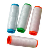 Damascus 4-Pcs Miracle Elastic Thread spools in a row