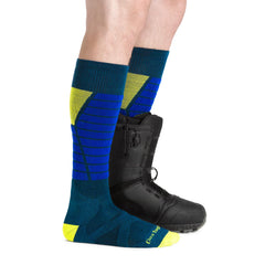 Darn Tough Function X OTC midweight over-the-calf sock stays in place during activities.