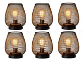A DECORKEY lantern with brown metal cage glows warmly for cozy indoor decor.