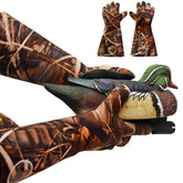 DecoyPro insulated camouflage gloves waterproof in action keep hands dry on marsh hunts.