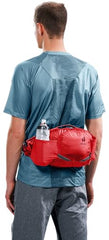 Deuter Pulse 5 hip bag hydration compatibility pocket in use during a ride.