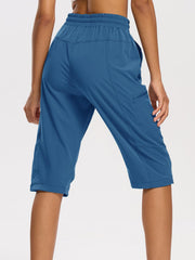 DEVOROPA women's hiking long shorts back view adjustable waistband