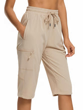 DEVOROPA women's hiking long shorts khaki front view highlighting lightweight quick-dry fabric for active days