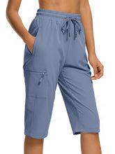 DEVOROPA women's hiking long shorts front view with breathable quick-dry fabric for hiking.