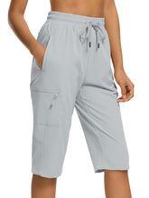 DEVOROPA women's hiking long shorts with zipper pockets for secure trail storage.