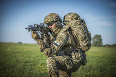 Direct Action neck gaiter FR Army Green used as face cover for dust defense.
