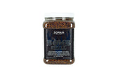 Domain Outdoor Bombshell reusable container holding 3 lb seed for half-acre plots.