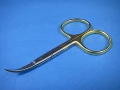 Dr. Slick All Purpose Scissor in use for fly tying in a travel kit