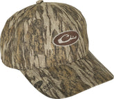 Drake Waterfowl men's waterproof camo cap, front view, conceals from above during hunts.