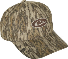 Drake Waterfowl men's waterproof camo cap, front view, conceals from above during hunts.