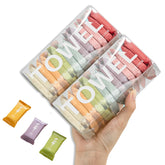 Dzronda disposable compressed towels packaging display, perfect for organized travel kits.
