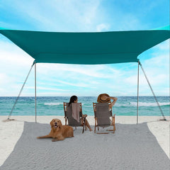 EasierHike Beach Shade Tent fully setup on sandy beach providing ample shade for family