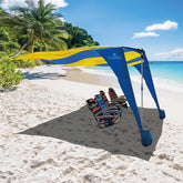 EASYGO Shark Fin Shade sand-pole setup showing quick anchoring for shade on the beach