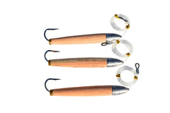 EatMyTackle cedar plug 6in rigged in water, ready for offshore trolling.