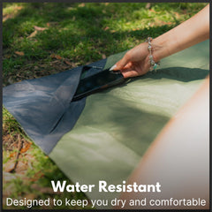Waterproof olive ground cover on grass highlights dry, clean picnic space.