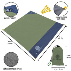 ECCOSOPHY blanket laid flat on sand showing corner pockets for anchoring.