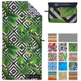ECCOSOPHY microfiber beach towel demonstrates sand-free comfort at the shore.