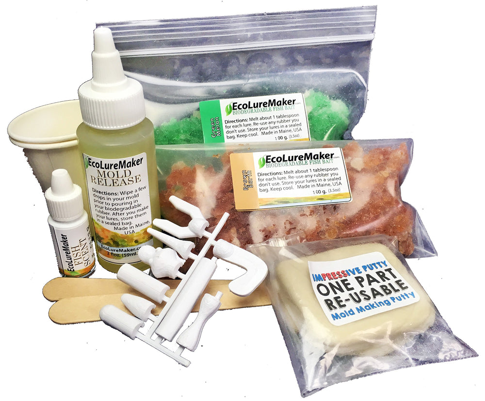 EcoLureMaker Soft Bait Kit components laid out with lures, heads, bodies, and tails