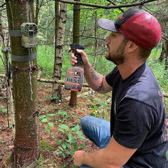 ElimiShield HUNT pre-hunt spray for scent management on boots and gloves.