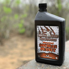 Elusive Wildlife Swine Sauce Extreme Strawberry bottle pour enhances night hog hunts