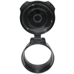 Close-up of black sun-shield disk on scope cap