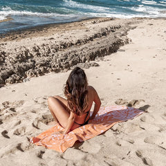 Eunzel double-sided towel design offers vibrant colors for pool or beach days.