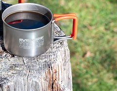 Evernew titanium espresso mug highlighting ultralight camping design.