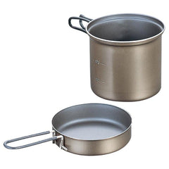 Evernew titanium non-stick deep pot 0.9L with folding handle for compact camping meals.