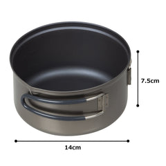 Evernew titanium non-stick pot with insulated handle, perfect for outdoor cooking on trails.