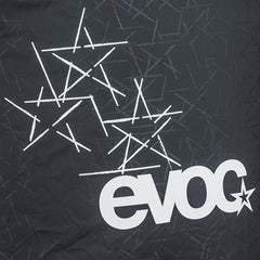 EVOC Raincover reflective print boosts visibility for safe night riding.