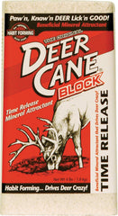 Evolved Habitats Deer Cane Block 4lb6 visible in field; long-lasting deer attractant.